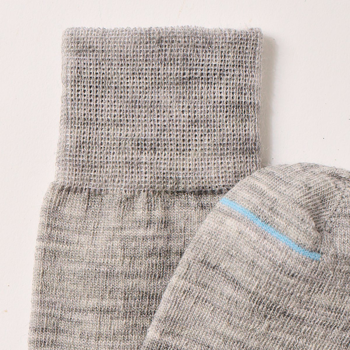 Plain grey merino wool socks with Sky toe strip simple but beautiful